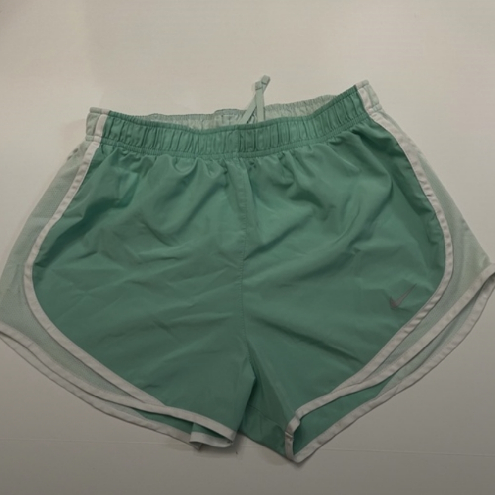 Green Nike running shorts